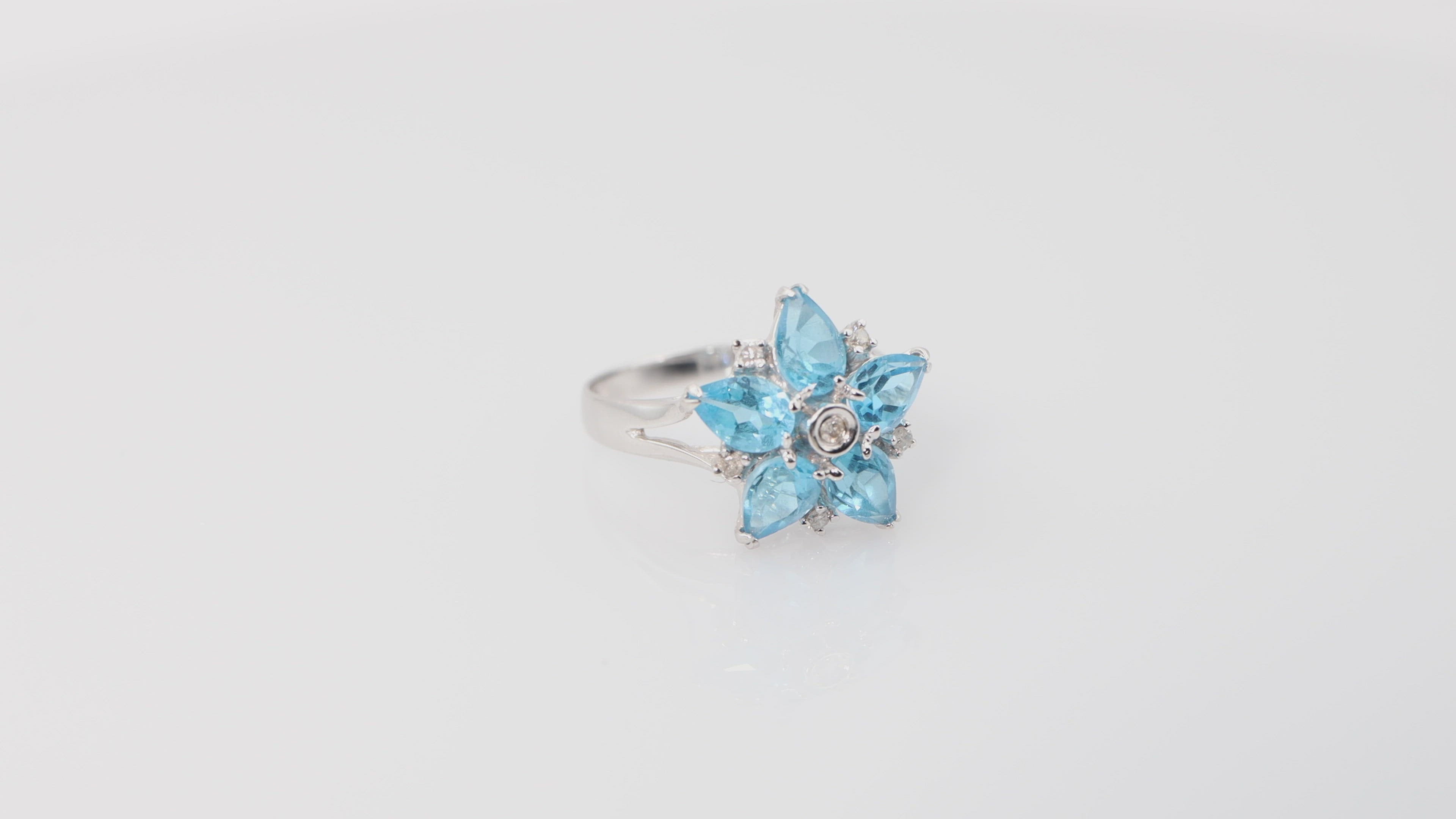 Blue Topaz Flower Ring with Diamonds in 14k White Gold