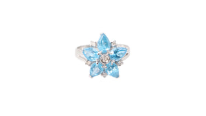 Blue Topaz Flower Ring with Diamonds in 14k White Gold