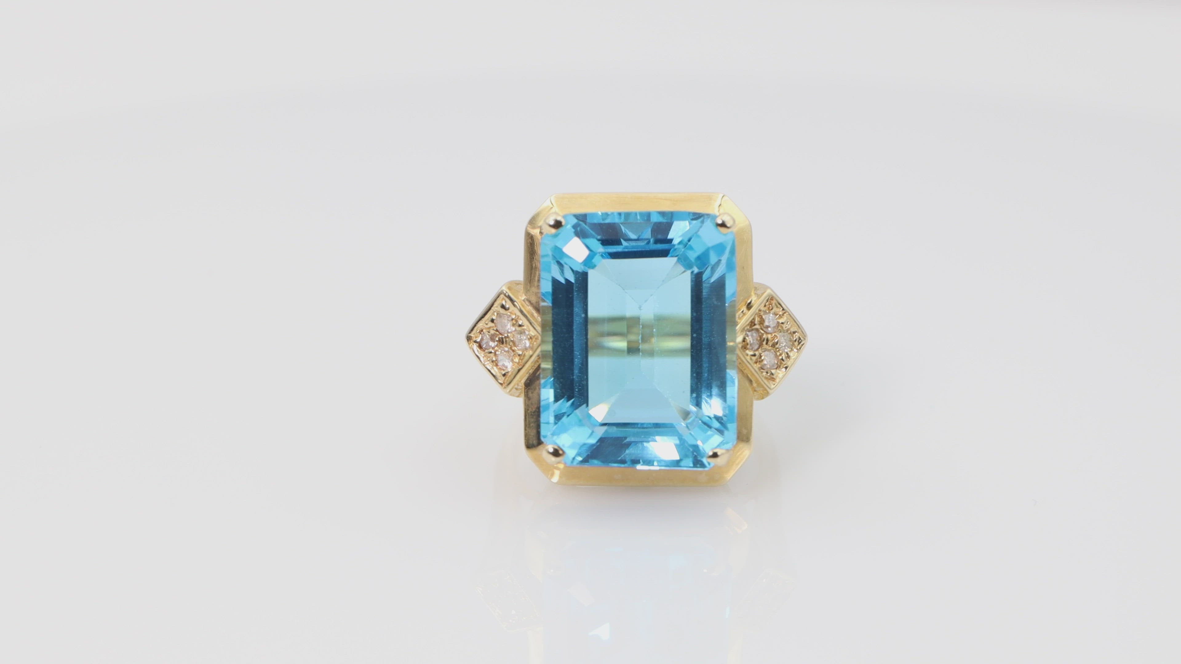 Blue Topaz and Diamond Ring in 14k Gold