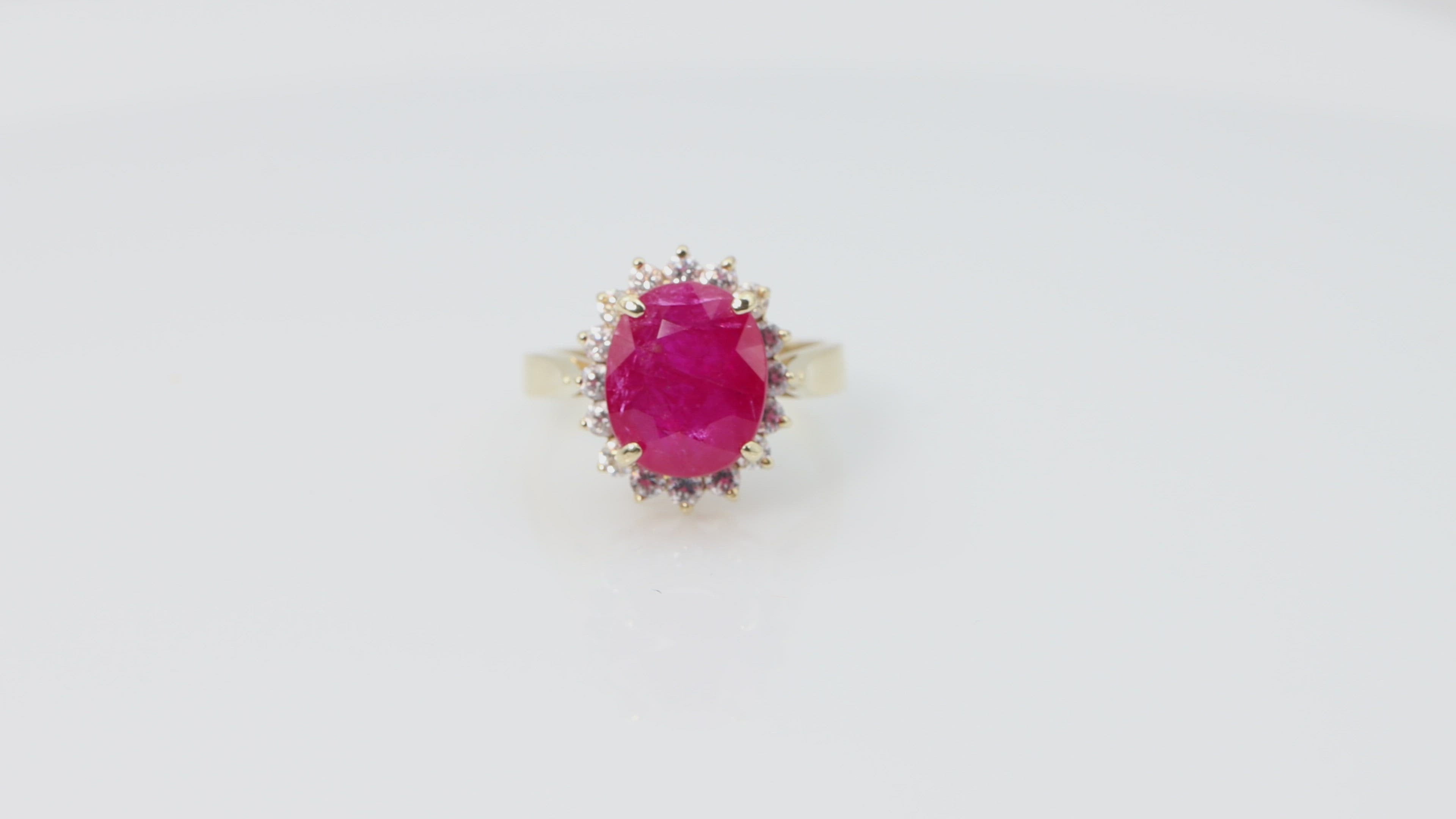 Oval Ruby with Diamond Halo in 14k Yellow Gold