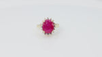 Load and play video in Gallery viewer, Oval Ruby with Diamond Halo in 14k Yellow Gold
